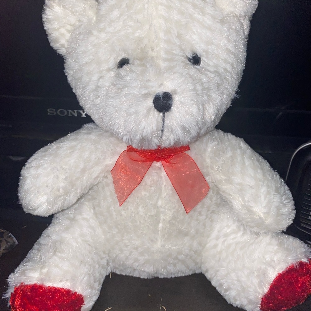 Small red and white bear